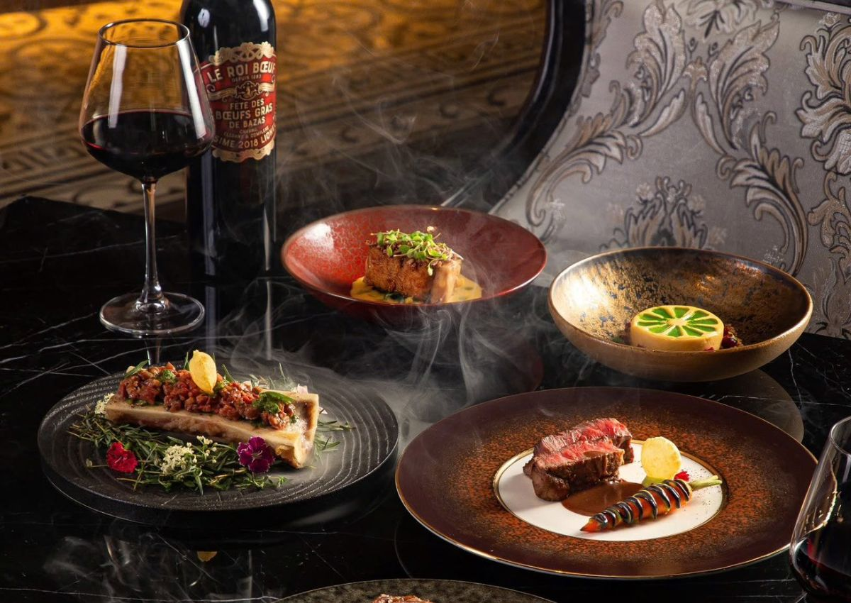 Tasting-menu dishes and wine at ONVIT, a contemporary Hanoi restaurant.