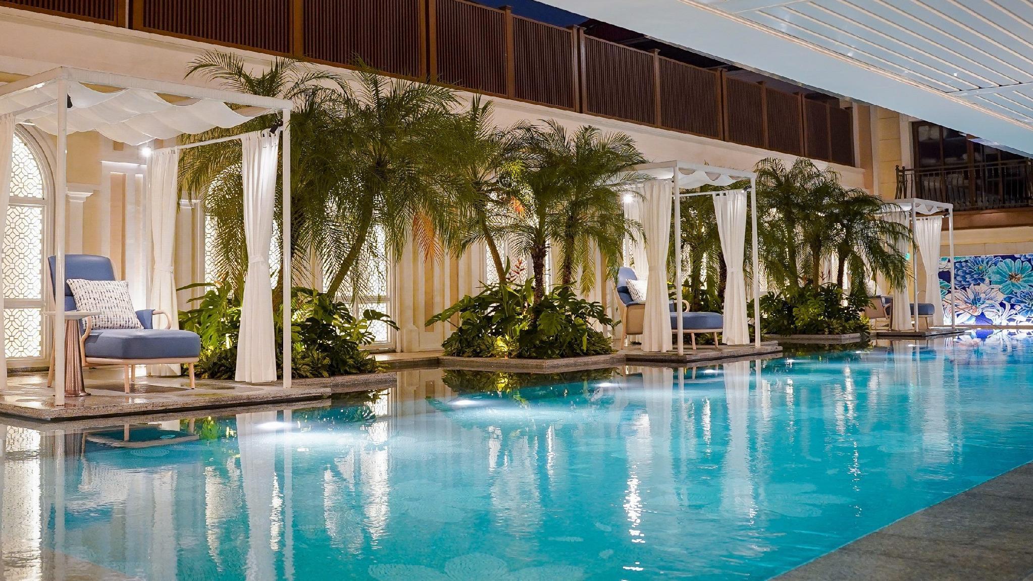 The heated outdoor pool at dusk
