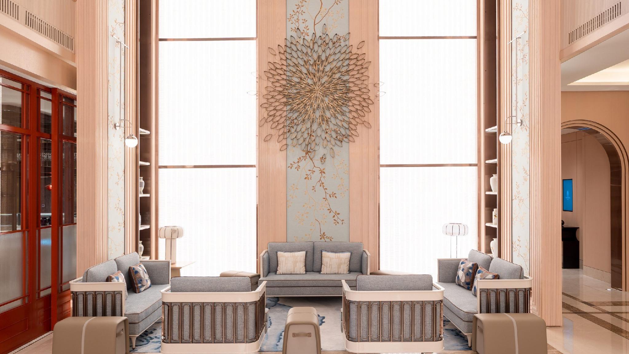 The hotel lounge with double-height ceiling