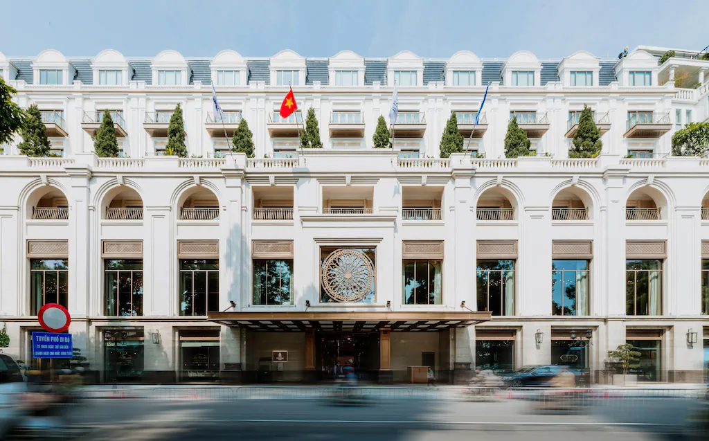 The Theodore Hanoi's white French-style facade near the lakeside.