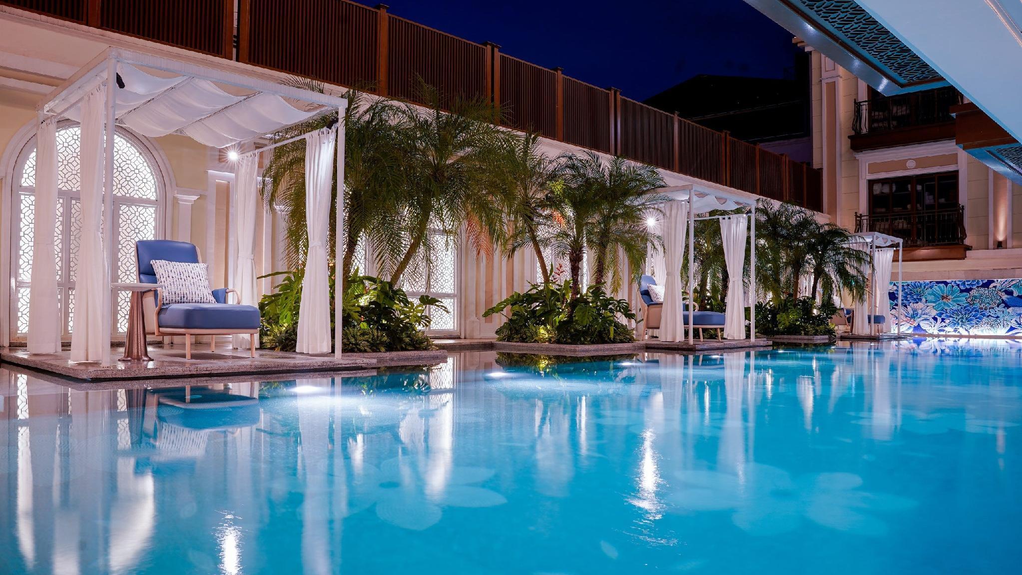 The heated outdoor pool at night